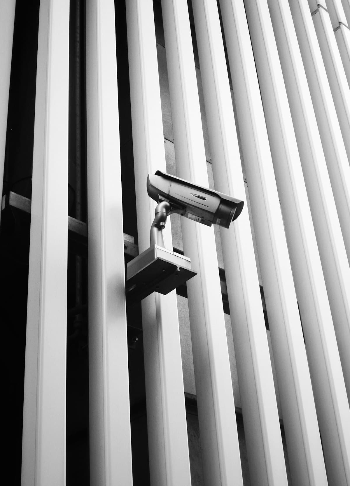 Security camera mounted on the exterior of a building, part of a recorded system